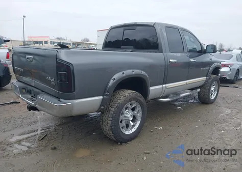 2003 Dodge Ram 1500 Slt/Laramie/St z USA, uszkodzony, nr VIN 1D7HU18Z73S136723